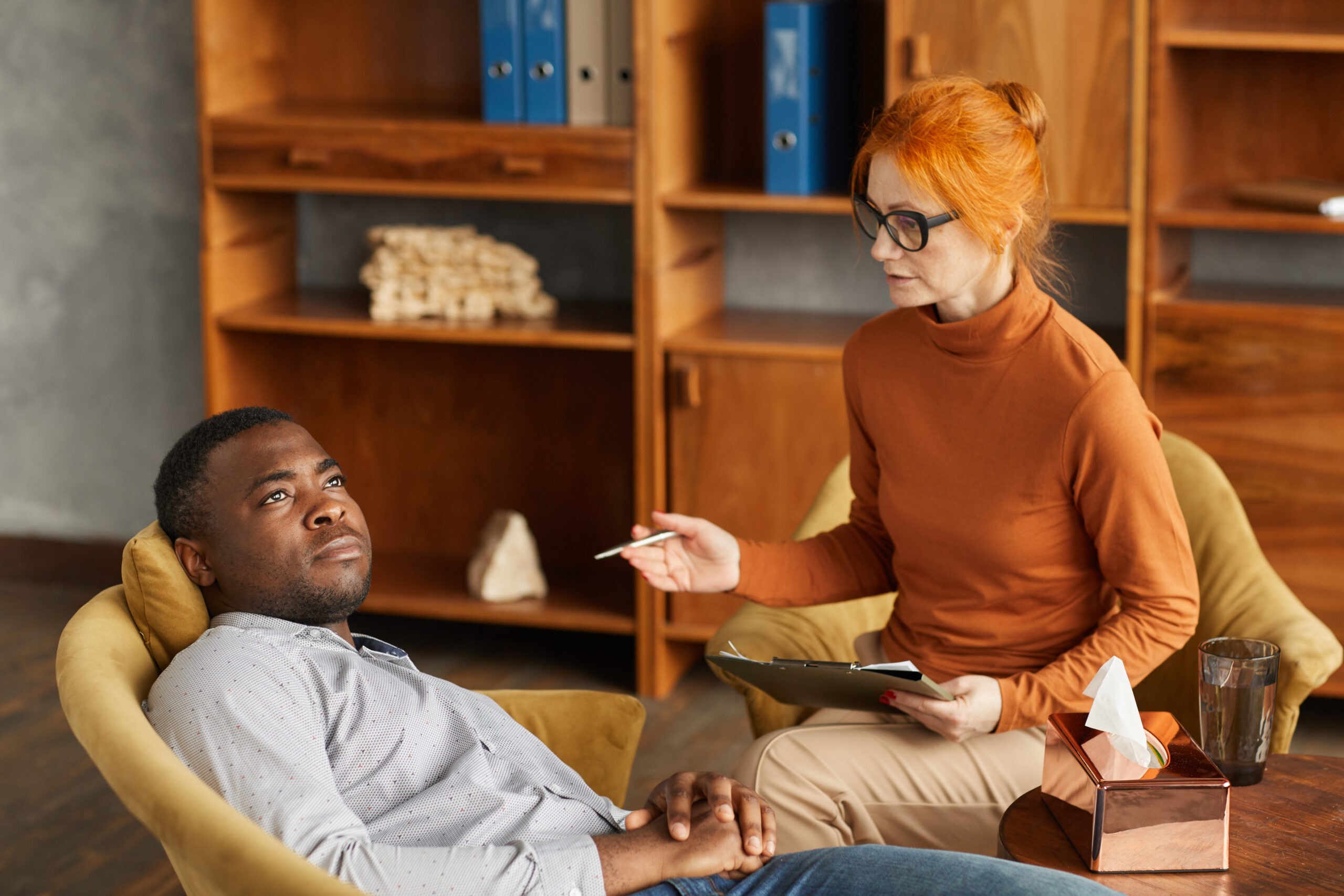 Psychologist working with her patient